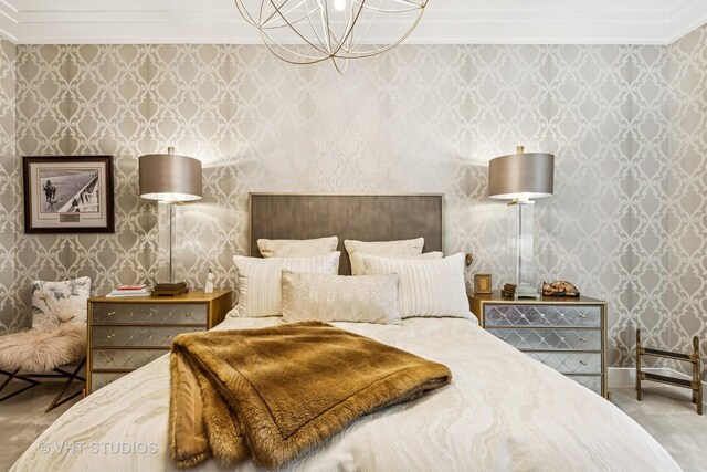118 E Erie St Unit 21D, Chicago, IL 60611 - carpeted bedroom with ornamental molding, a chandelier, and wallpapered walls