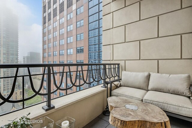 118 E Erie St Unit 21D, Chicago, IL 60611 - balcony featuring an outdoor hangout area and a city view