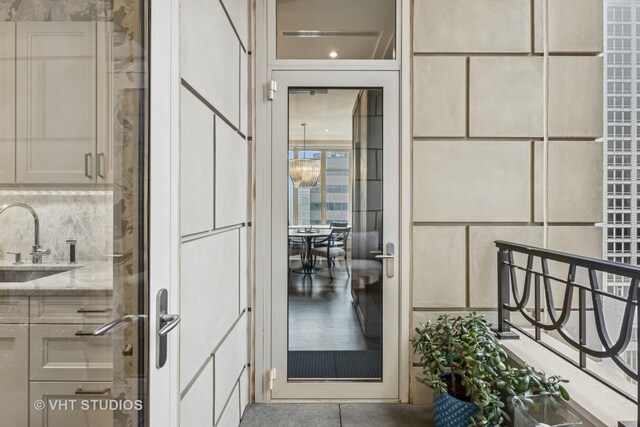 118 E Erie St Unit 21D, Chicago, IL 60611 - view of exterior entry with a sink