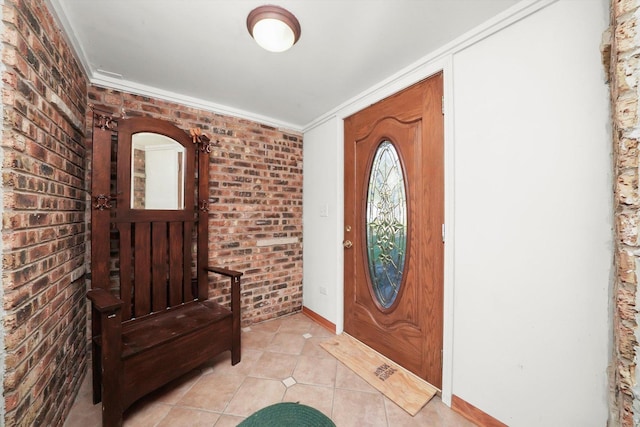 1423 N River Rd, Mchenry, IL 60050 - entrance foyer featuring brick wall, ornamental molding, light tile patterned floors, and baseboards