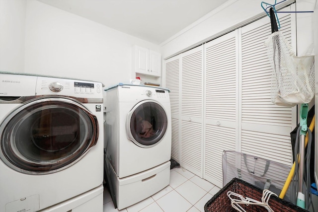 1423 N River Rd, Mchenry, IL 60050 - washroom featuring washer and clothes dryer and light tile patterned flooring