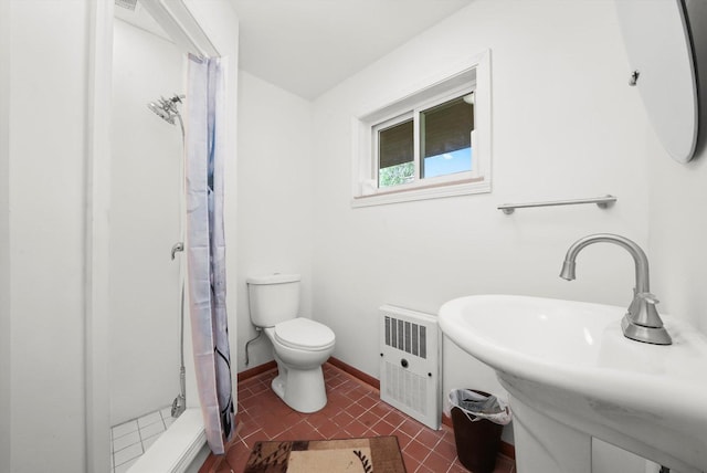 1423 N River Rd, Mchenry, IL 60050 - full bathroom featuring a stall shower, toilet, a sink, and tile patterned floors
