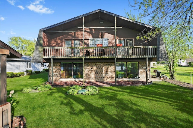 1423 N River Rd, Mchenry, IL 60050 - rear view of house with brick siding and a lawn