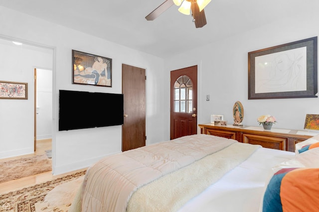 10407 S Artesian Ave, Chicago, IL 60655 - bedroom with light wood-style flooring, ceiling fan, and baseboards