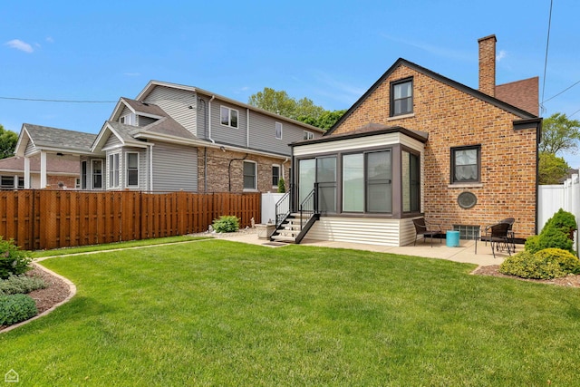 10407 S Artesian Ave, Chicago, IL 60655 - back of house with brick siding, a chimney, a patio, entry steps, and a sunroom