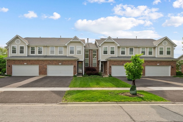 7324 Chestnut Hills Dr, Burr Ridge, IL 60527 - multi unit property featuring brick siding, an attached garage, and driveway