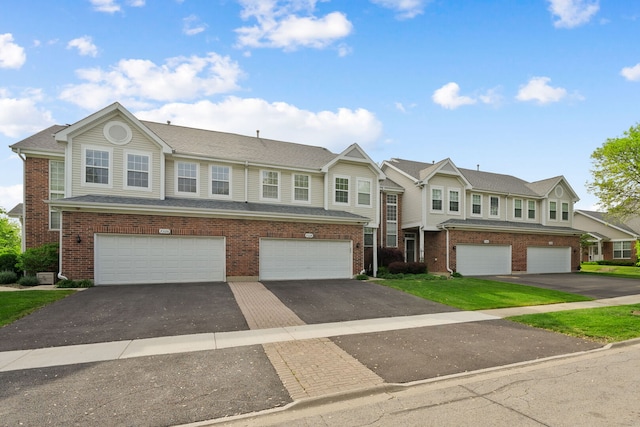 7324 Chestnut Hills Dr, Burr Ridge, IL 60527 - multi unit property with driveway, an attached garage, and brick siding
