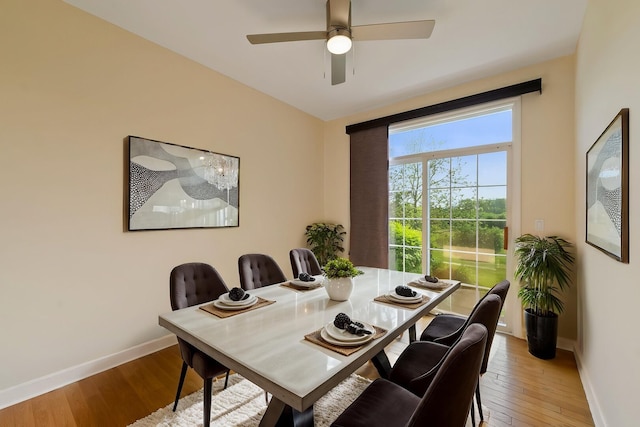 7324 Chestnut Hills Dr, Burr Ridge, IL 60527 - dining space with baseboards, light wood finished floors, and a ceiling fan