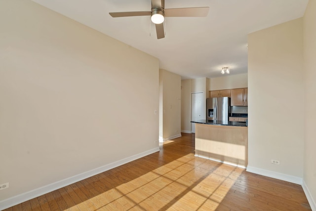 7324 Chestnut Hills Dr, Burr Ridge, IL 60527 - unfurnished living room with hardwood / wood-style flooring, baseboards, and a ceiling fan