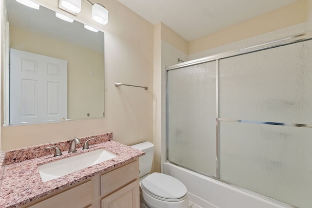 7324 Chestnut Hills Dr, Burr Ridge, IL 60527 - bathroom featuring toilet, vanity, and bath / shower combo with glass door
