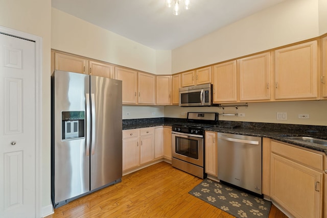 7324 Chestnut Hills Dr, Burr Ridge, IL 60527 - kitchen featuring stainless steel appliances, light brown cabinetry, and light wood-type flooring