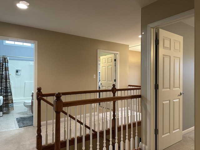 445 Spring Park Loop, Bourbonnais, IL 60914 - hallway featuring an upstairs landing, light carpet, baseboards, and recessed lighting