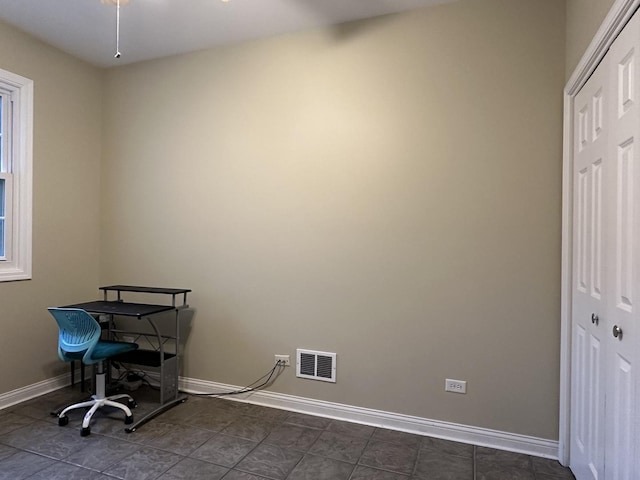 445 Spring Park Loop, Bourbonnais, IL 60914 - unfurnished office with baseboards and dark tile patterned flooring