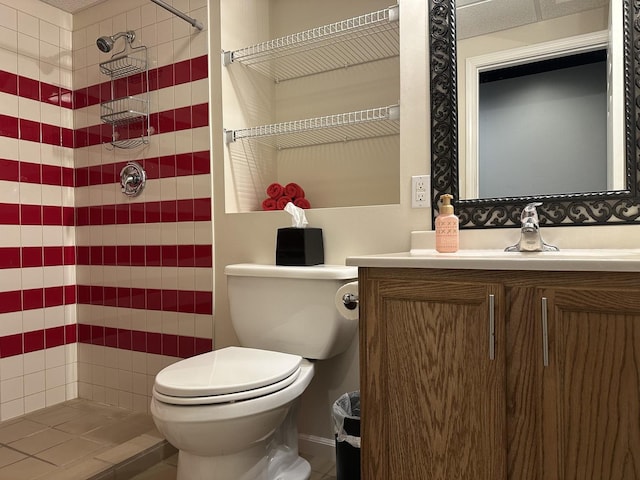 445 Spring Park Loop, Bourbonnais, IL 60914 - bathroom featuring tiled shower, toilet, and vanity
