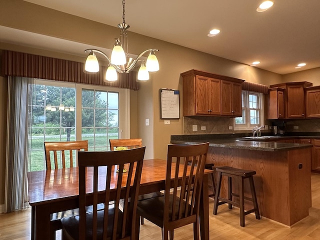 445 Spring Park Loop, Bourbonnais, IL 60914 - dining area featuring light wood-style floors, recessed lighting, and a chandelier