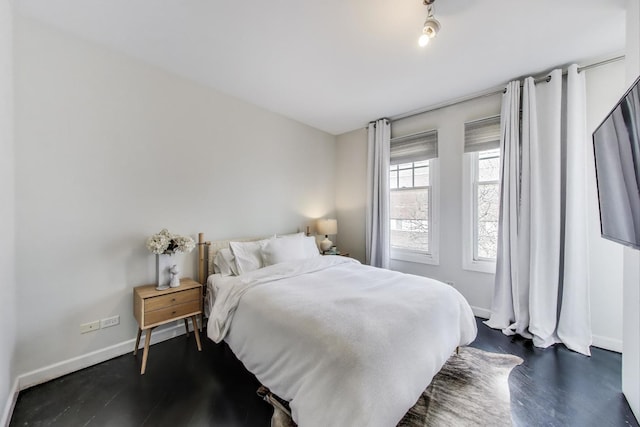 335 E Cullerton St, Chicago, IL 60616 - bedroom with dark wood finished floors and baseboards