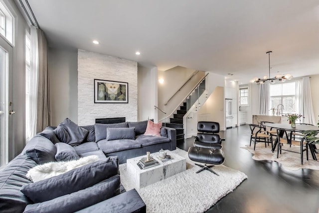 335 E Cullerton St, Chicago, IL 60616 - living area with stairs, a chandelier, a fireplace, and recessed lighting