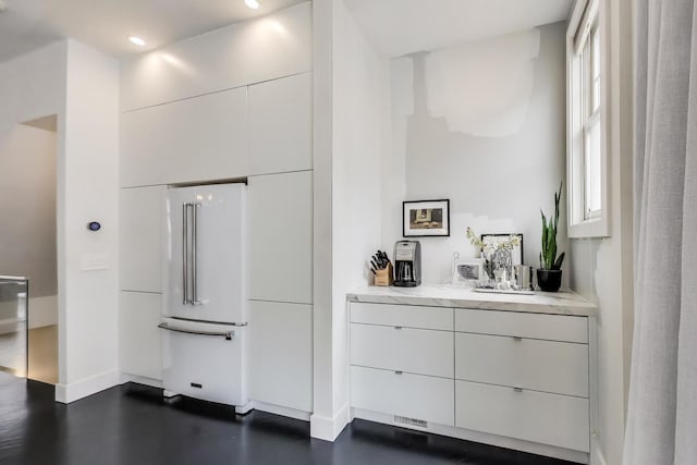 335 E Cullerton St, Chicago, IL 60616 - kitchen featuring high end fridge, baseboards, white cabinetry, modern cabinets, and recessed lighting