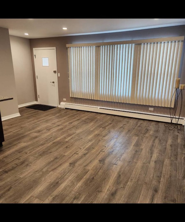 720 N Western Ave Unit 10, Park Ridge, IL 60068 - entrance foyer with baseboard heating, wood finished floors, recessed lighting, and baseboards