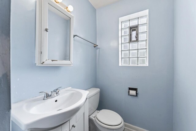 7843 S Yates Blvd, Chicago, IL 60649 - bathroom featuring vanity and toilet