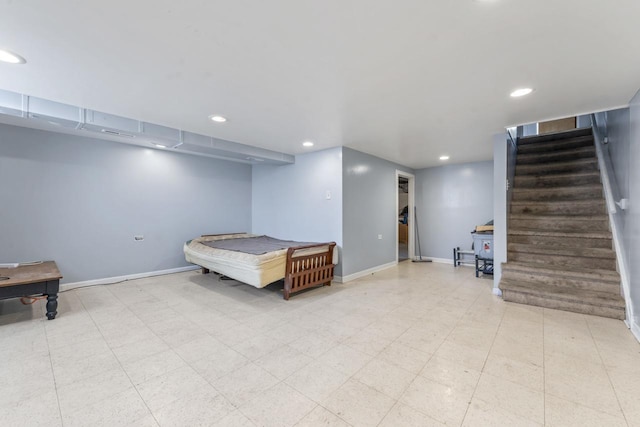 7843 S Yates Blvd, Chicago, IL 60649 - finished basement with baseboards, stairway, and recessed lighting
