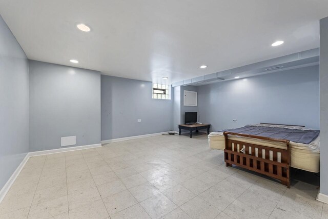 7843 S Yates Blvd, Chicago, IL 60649 - below grade area featuring baseboards and recessed lighting