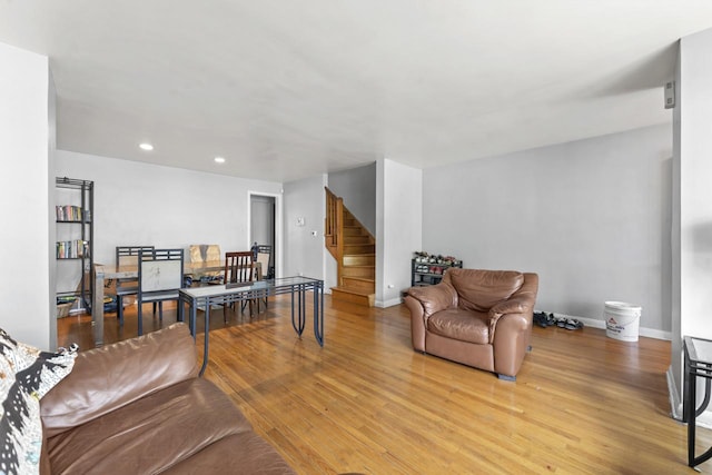 7843 S Yates Blvd, Chicago, IL 60649 - living area featuring stairs, wood finished floors, recessed lighting, and baseboards