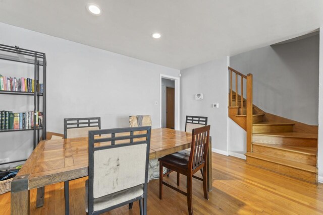 7843 S Yates Blvd, Chicago, IL 60649 - dining room featuring stairs, wood finished floors, baseboards, and recessed lighting