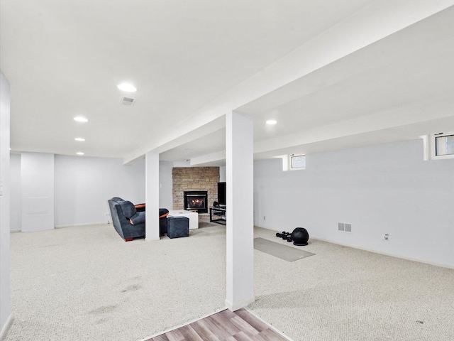 3405 N Osage Ave, Chicago, IL 60634 - basement featuring a large fireplace, recessed lighting, carpet, wood finished floors, and baseboards