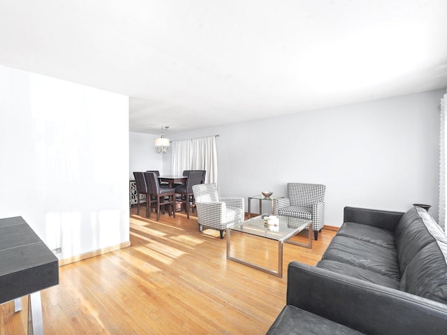 3405 N Osage Ave, Chicago, IL 60634 - living area with light wood-style floors and baseboards