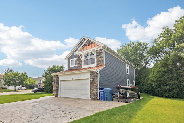 1 Churchill Ct, South Elgin, IL 60177 - view of side of property with stone siding, driveway, an attached garage, and a lawn