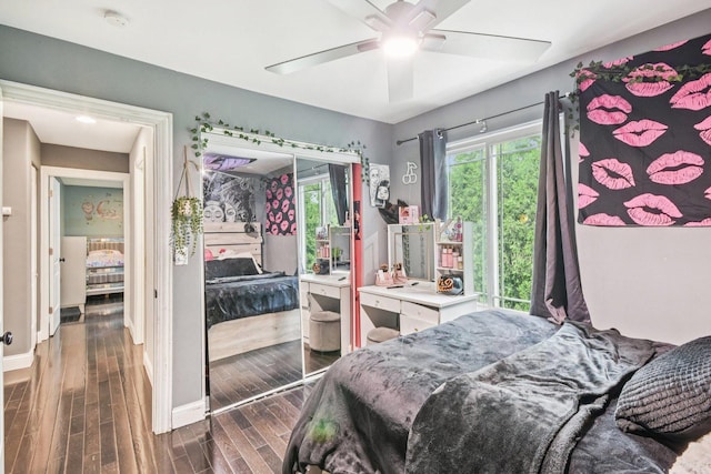 1 Churchill Ct, South Elgin, IL 60177 - bedroom with dark wood-style flooring, baseboards, and a ceiling fan