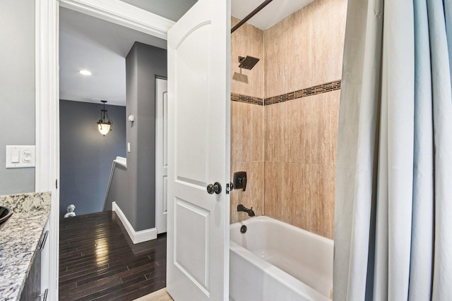 1 Churchill Ct, South Elgin, IL 60177 - full bathroom with shower / bath combo with shower curtain, wood finished floors, vanity, and baseboards