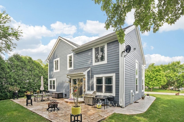 1 Churchill Ct, South Elgin, IL 60177 - rear view of property with a patio area, a yard, and an outdoor fire pit