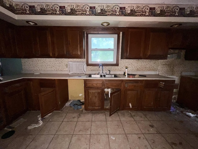 103 W 2nd St, Broadlands, IL 61816 - kitchen with a sink, light tile patterned floors, and light countertops