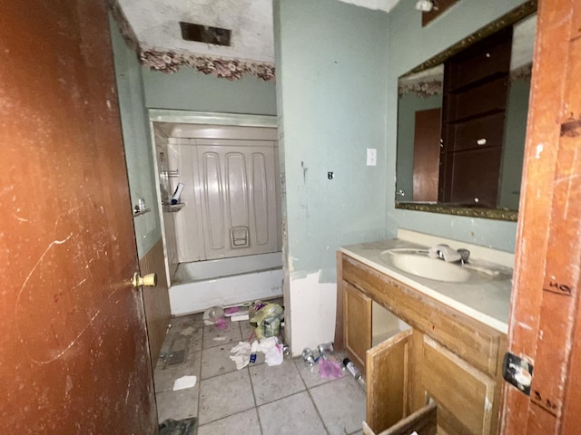 103 W 2nd St, Broadlands, IL 61816 - bathroom with vanity and tile patterned flooring