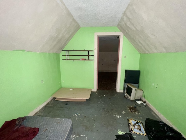 103 W 2nd St, Broadlands, IL 61816 - bonus room with lofted ceiling, baseboards, and heating unit