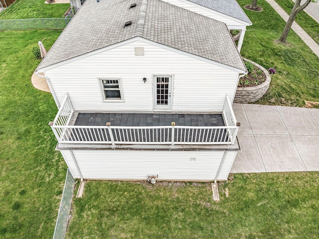 1810 Portsmouth Ln, Schaumburg, IL 60194 - back of property featuring a shingled roof and a yard