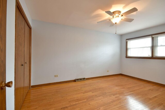 4732 N Anthon Ave, Chicago, IL 60656 - unfurnished bedroom featuring light wood-type flooring, ceiling fan, and baseboards