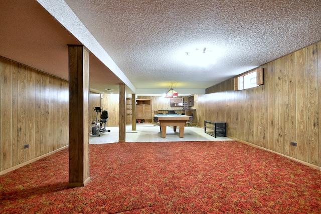 4732 N Anthon Ave, Chicago, IL 60656 - playroom featuring wooden walls, a textured ceiling, billiards table, baseboards, and carpet flooring