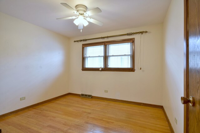 4732 N Anthon Ave, Chicago, IL 60656 - unfurnished room with light wood-style flooring, ceiling fan, and baseboards