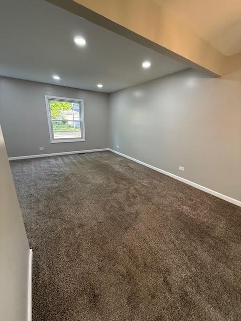 2030 University Dr, Naperville, IL 60565 - spare room featuring dark colored carpet, recessed lighting, and baseboards