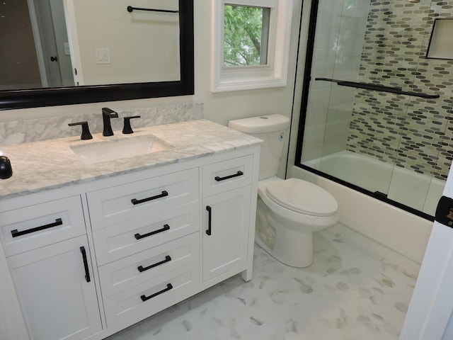 2030 University Dr, Naperville, IL 60565 - bathroom with toilet, vanity, enclosed tub / shower combo, and marble finish floors