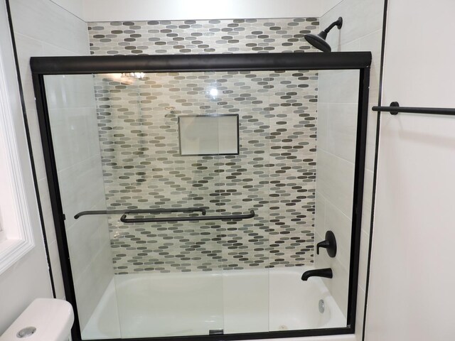 2030 University Dr, Naperville, IL 60565 - bathroom featuring combined bath / shower with glass door
