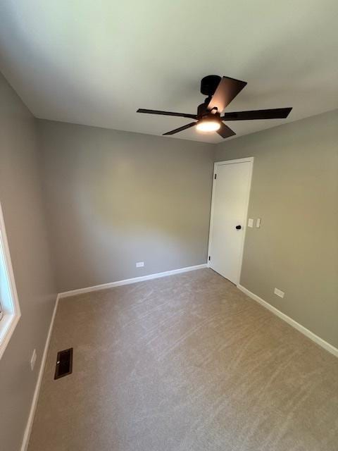 2030 University Dr, Naperville, IL 60565 - carpeted empty room with a ceiling fan and baseboards