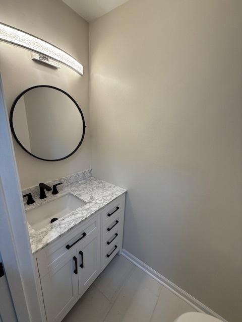 2030 University Dr, Naperville, IL 60565 - bathroom featuring vanity and baseboards
