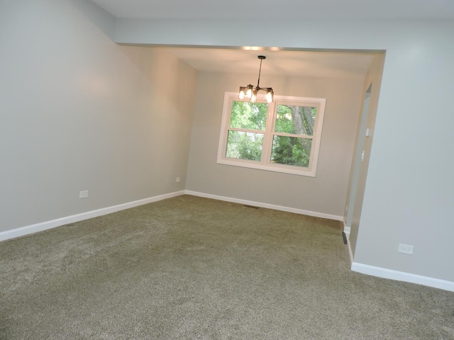 2030 University Dr, Naperville, IL 60565 - spare room featuring a chandelier, carpet flooring, and baseboards