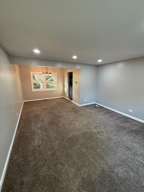 2030 University Dr, Naperville, IL 60565 - spare room featuring baseboards, dark colored carpet, and recessed lighting