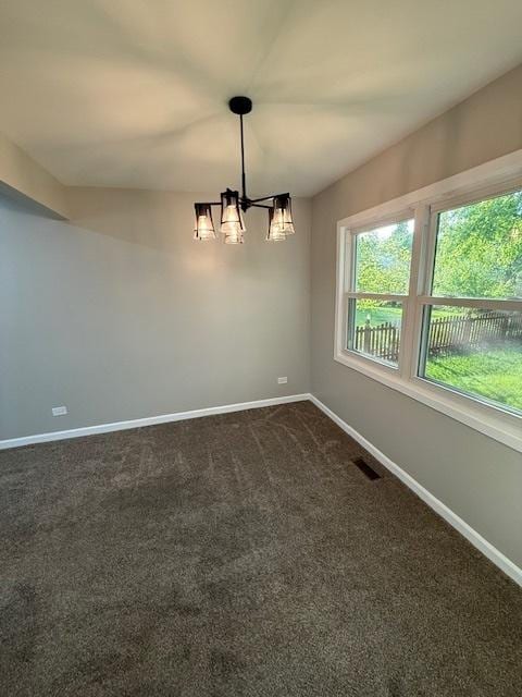 2030 University Dr, Naperville, IL 60565 - empty room featuring a chandelier, healthy amount of natural light, and baseboards