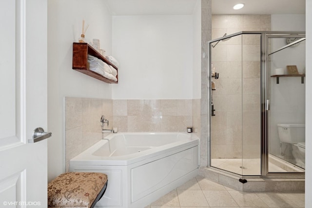 1618 S Halsted St Unit 4D, Chicago, IL 60608 - bathroom featuring a bath, a stall shower, tile patterned flooring, and toilet